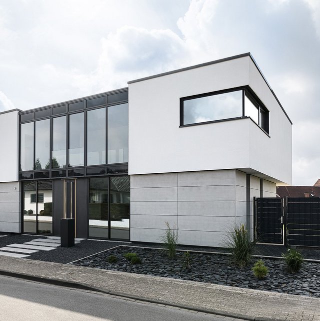 Ein Haus mit imi-Fassade vintage Verkleidung